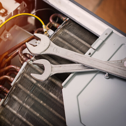 tools on top of an air conditioner